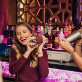 Guests enjoying a cocktail masterclass at The Sugar Cane bar in Clapham Junction, London