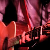 A close-up of a live music performance at The Sugar Cane Bar, Clapham Junction. Discover exciting bands, DJs, and tropical vibes at one of London’s most unique cocktail bars.